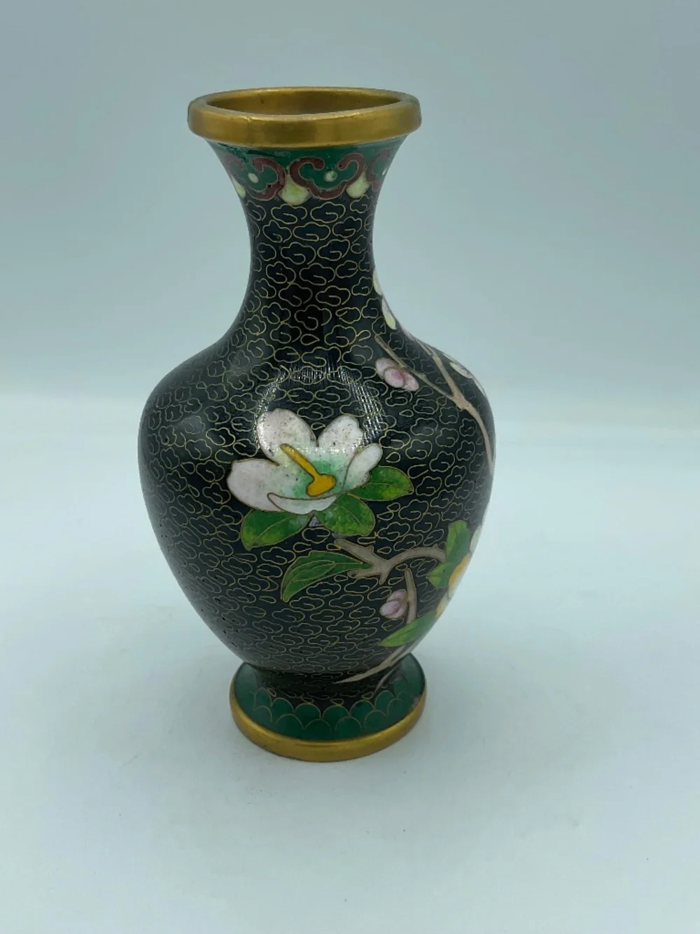 Chinese cloisonné enamel vase features a black background Floral Cherry Blossoms